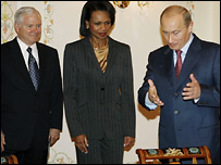 Путін з Райс і Ґейтсом