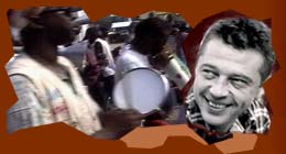 Andy Kershaw with Haitian street band (©Roger Short)