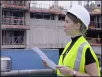 Workers singing on a construction site