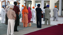 Sikhs praying in gurdwara. Source: iStockphoto © Loic Bernard