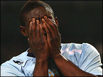Manchester City's Micah Richards hides his face in his hands after missing a chance against Hamburg in the UEFA Cup quarter final (c) Getty Images