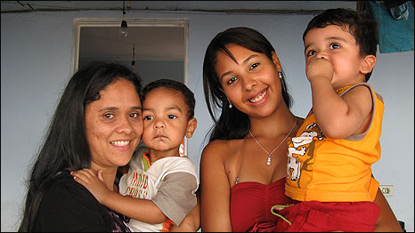 Elaine with Davidson Samue, who is not her biological son (left); and Queila with Lucas Daniel, who is not her biological son (right)