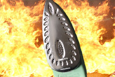 An iron with fire in the background