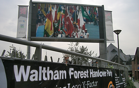 The Big Screen in Walthamstow Town Square broadcasts the Paralympic closing ceremony from Beijing