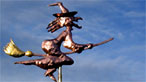 Weathervane featuring a witch on broomstick