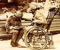 Photo of a wounded Indian soldier dictating a letter
