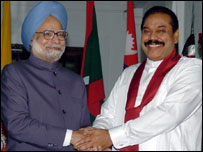PM Singh (Left) with President Rajapaksa