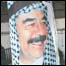 Cartaz com a imagem de Saddam Hussein