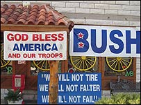 बुश पर ईश्वर की कृपा के बैनर