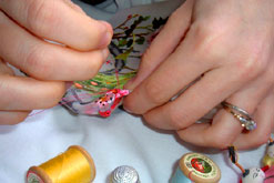 Close up of hands doing embroidery (credit: ©P. Winberg)