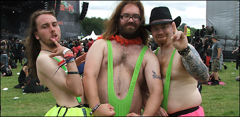 Three scary metal fans enjoying the festivities