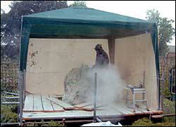 The stone is put under cover so work can begin.