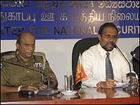 Luxman Hulugalle (r) at a press conference