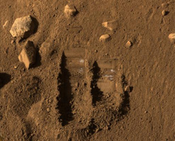 Image of two trenches dug by NASA Phoenix's Robotic Arm.