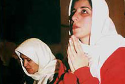 Image: Iraqi Women studying and at prayer