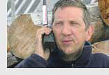 Brett on satellite phone