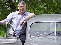 David Clayton with a Morris Minor Traveller