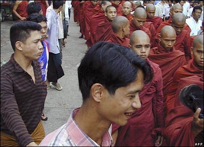Buddhist monks accompanied by civilians protest on 23 September.