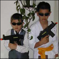Zack (on the right) with brother Luke playing at James Bond