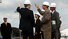 People dressed as office workers