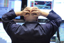 A man holding his hands on his head