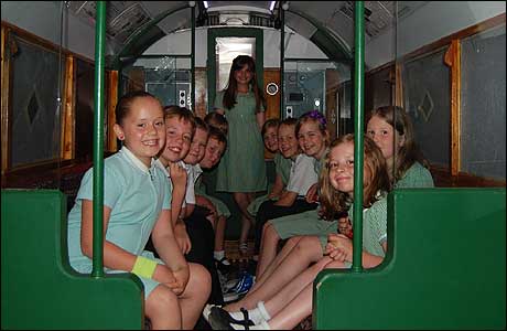 Children in a wartime underground carriage