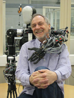 Professor Chris Melhuish with Bert the robot