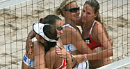 Georgia and Russia beach volleyball teams hug before their match