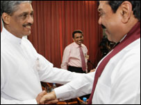 Main presidential candidates: Gen Fonseka (l) shaking hands with President Rajapaksa (file photo)