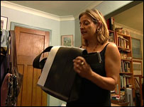 Samantha Heath shows the Murrays a bag made of recycled seatbelts