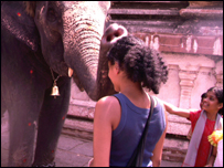Amy is blessed by an elephant called Lakshmi