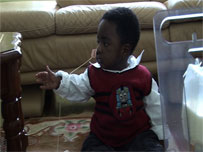 baby sitting down - Damario Taylor