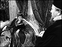 Stephanie Beacham as Mary and Ewan Roberts as the Bishop of Ross, BBC drama The Queen's Traitor, 1967