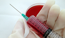 A syringe filled with blood