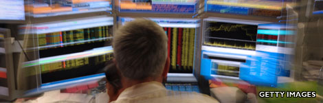 Trader in front of computers