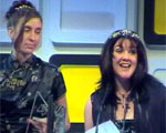 Julie Howell (on the right) making her acceptance speech at The Yell UK Web Awards in 2000, accompanied by Jooly's Joint member Nessa Folks