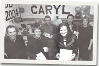 Caryl Lewis, Luned Emyr a staff Y Lolfa yn dathlu llwyddiant Caryl.