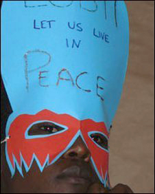 A gay activist in Uganda wearing a mask (Photo: Katherine Elaine Roubos)