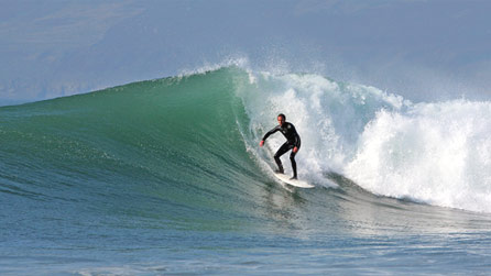 A surfer at Hell's Mouth by Martin Turtle @ Turtle Photography