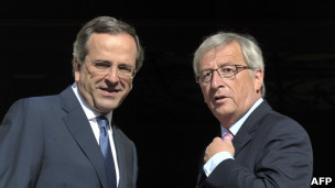 Samaras e Juncker | Crédito da foto: AFP