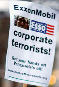 cartaz em protesto contra Exxon Mobil
