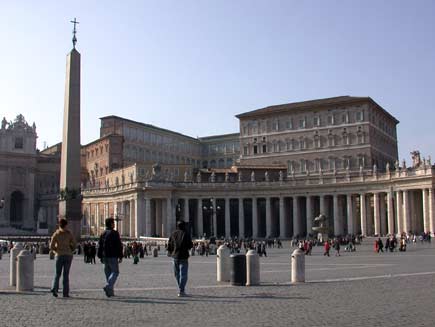 People in Saint Peter's Square surrounded by colonnaded buildings