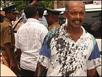 A protester after the tar attack (photo Prasad Purnimal Jayamanne)