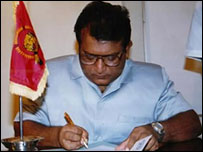 LTTE leader Velupillai Prabhakaran signing the CFA