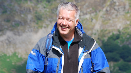 Derek walking in the hills