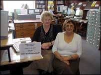 Two women in a library