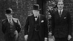 Churchill leaving Downing St  with Sir Kingsley Wood and Anthony Eden, 10 May 1940.
