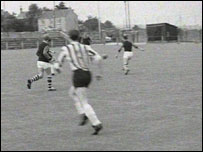 Football players on pitch