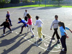 Children playing hopscotch
