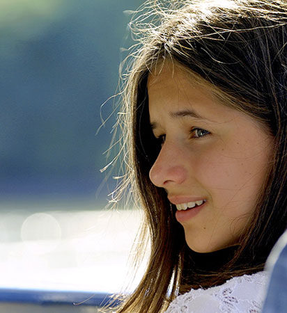 Girl smiling, photo by Tom Ang